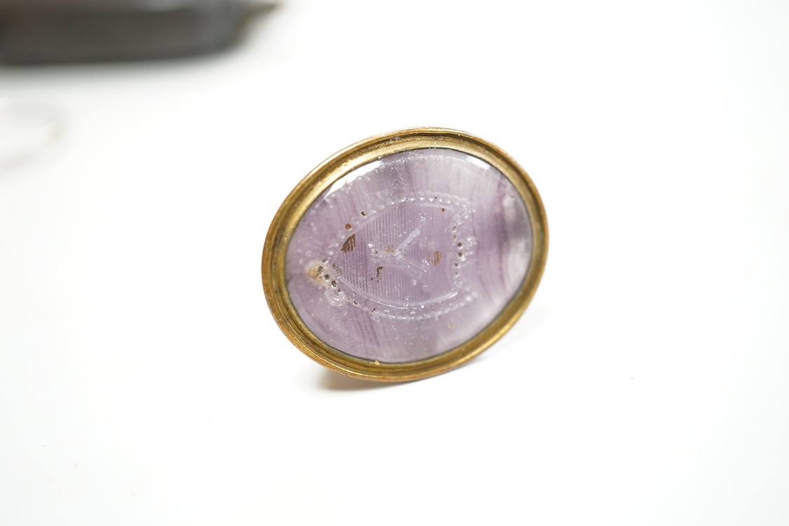 A William IV engine turned silver etui case, maker GC, London, 1836, 61mm, together with a silver purse mount, amethyst? set fob seal and a base metal sovereign case.